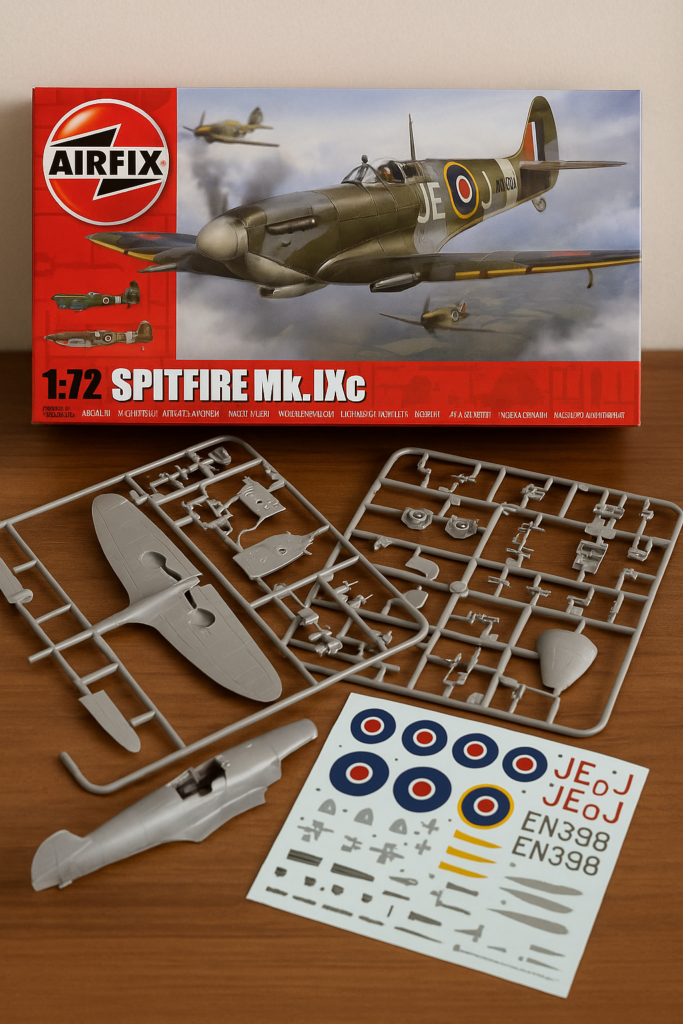 Airfix Spitfire Mk IXc unassembled scale model kit with box art, parts, and RAF decals.
